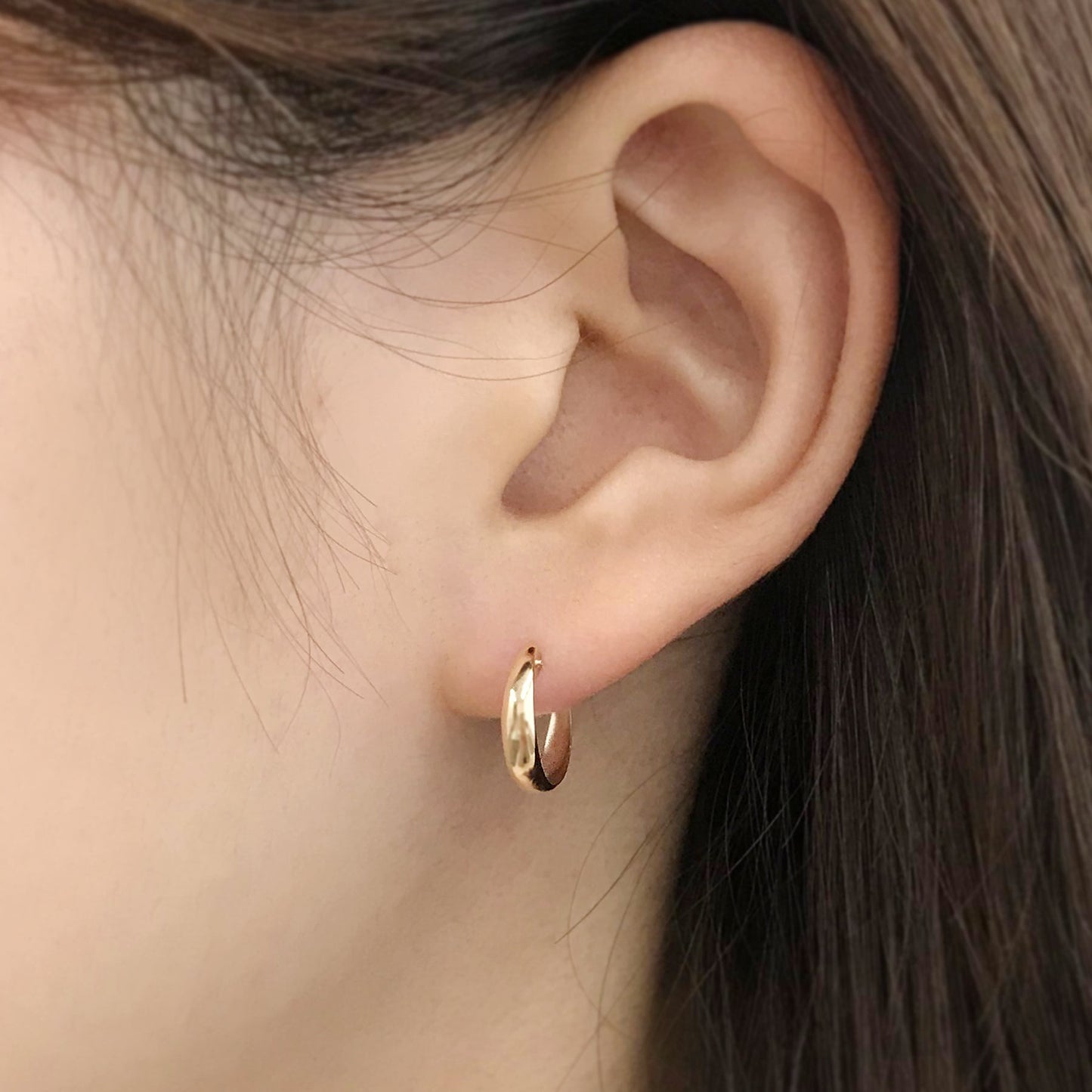 18K/10K Yellow Gold Chunky Hoop Earrings - Model Image