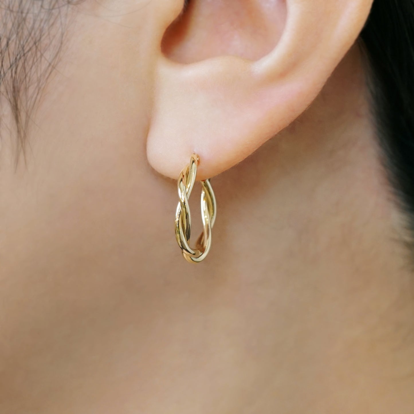 18K/10K Twisted Pipe Hoop Earrings (Yellow Gold) - Model Image