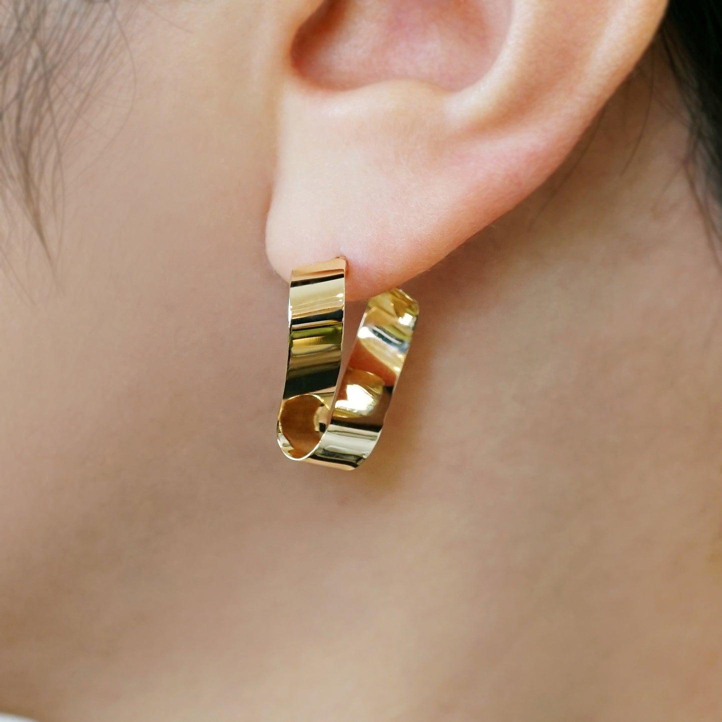 18K/10K Twisted Plate Hoop Earrings (Yellow Gold) - Model Image