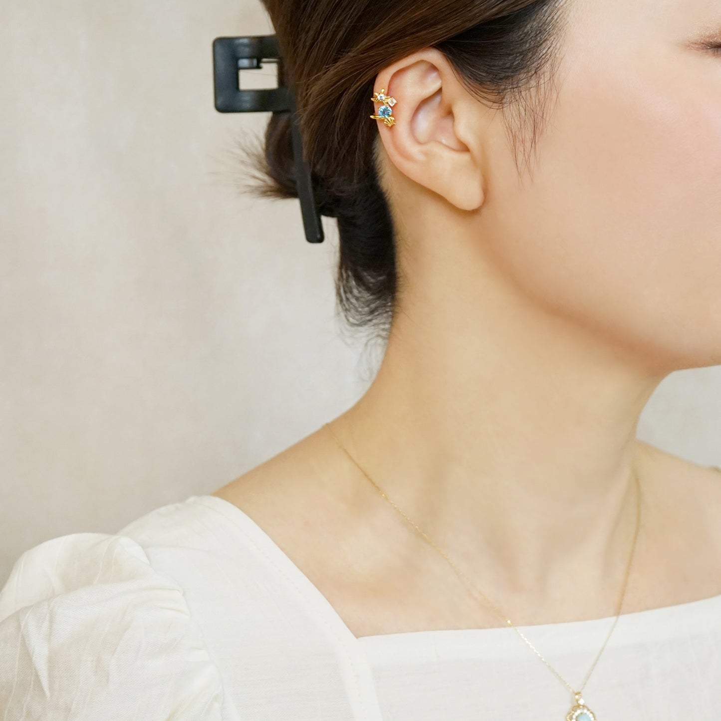 925 Sterling Silver Blue Topaz Coquille Ear Cuff - Model Image