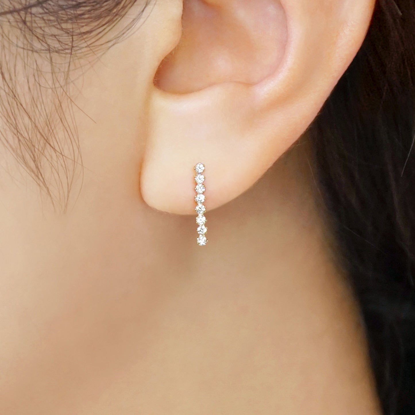 10K Vertical Line Stud Earrings (Yellow Gold) - Model Image