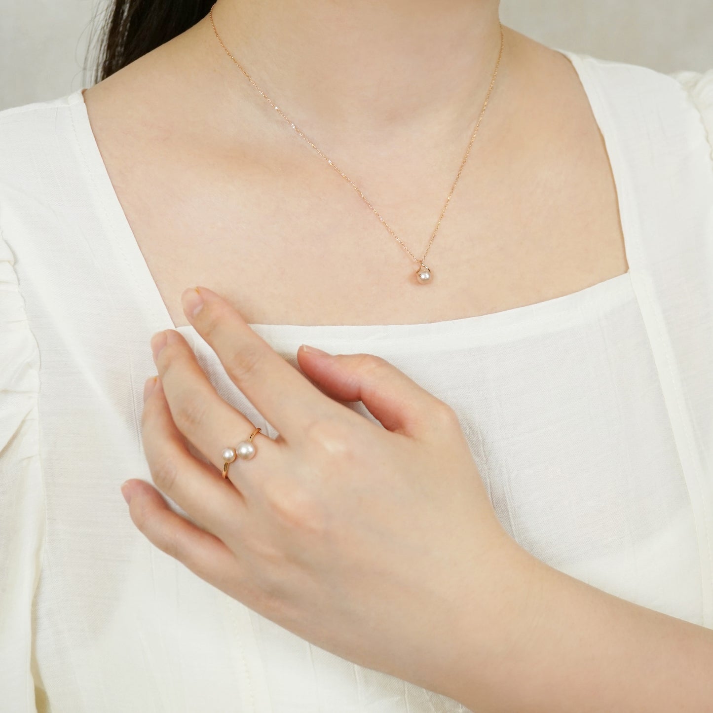 10K Freshwater Pearl Infinity Necklace (Rose Gold) - Model Image