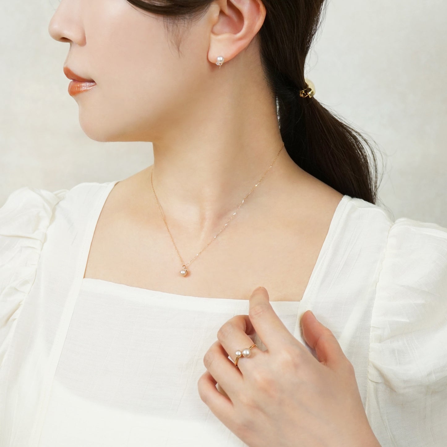 10K Freshwater Pearl Infinity Necklace (Rose Gold) - Model Image