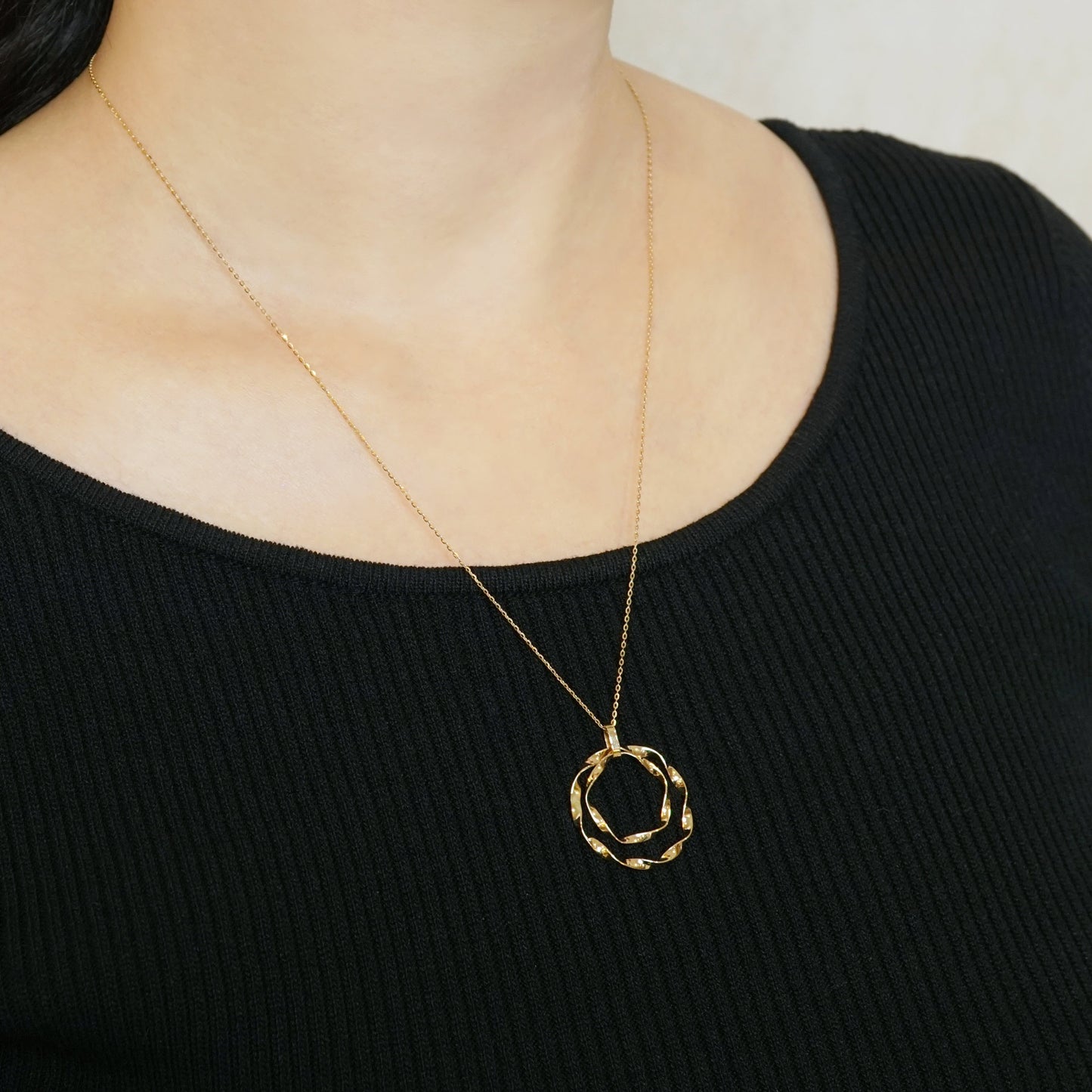 10K Twisted Ribbon Double Circle Necklace (Yellow Gold) - Model Image