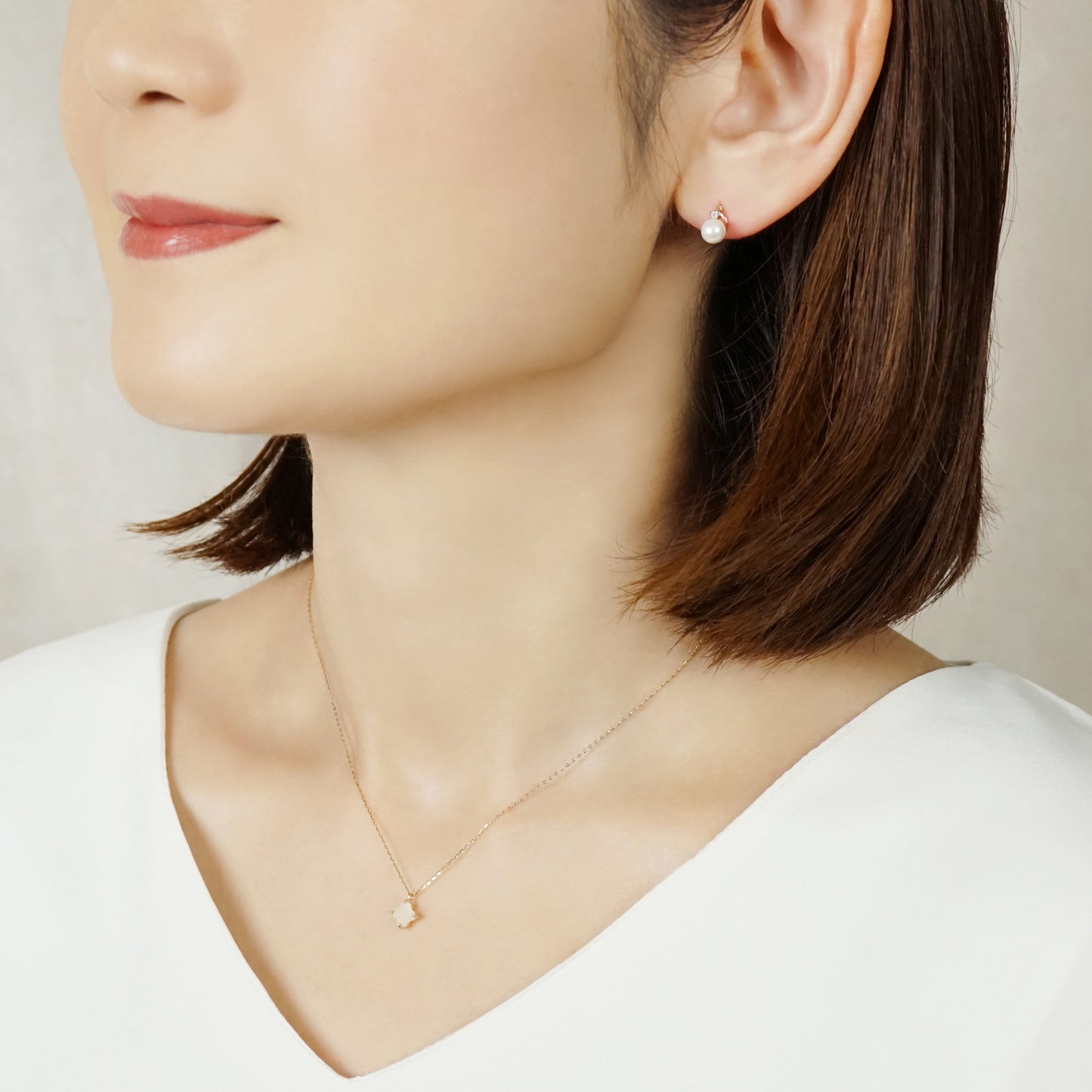 10K Moonstone Lily Necklace (Yellow Gold) - Model Image