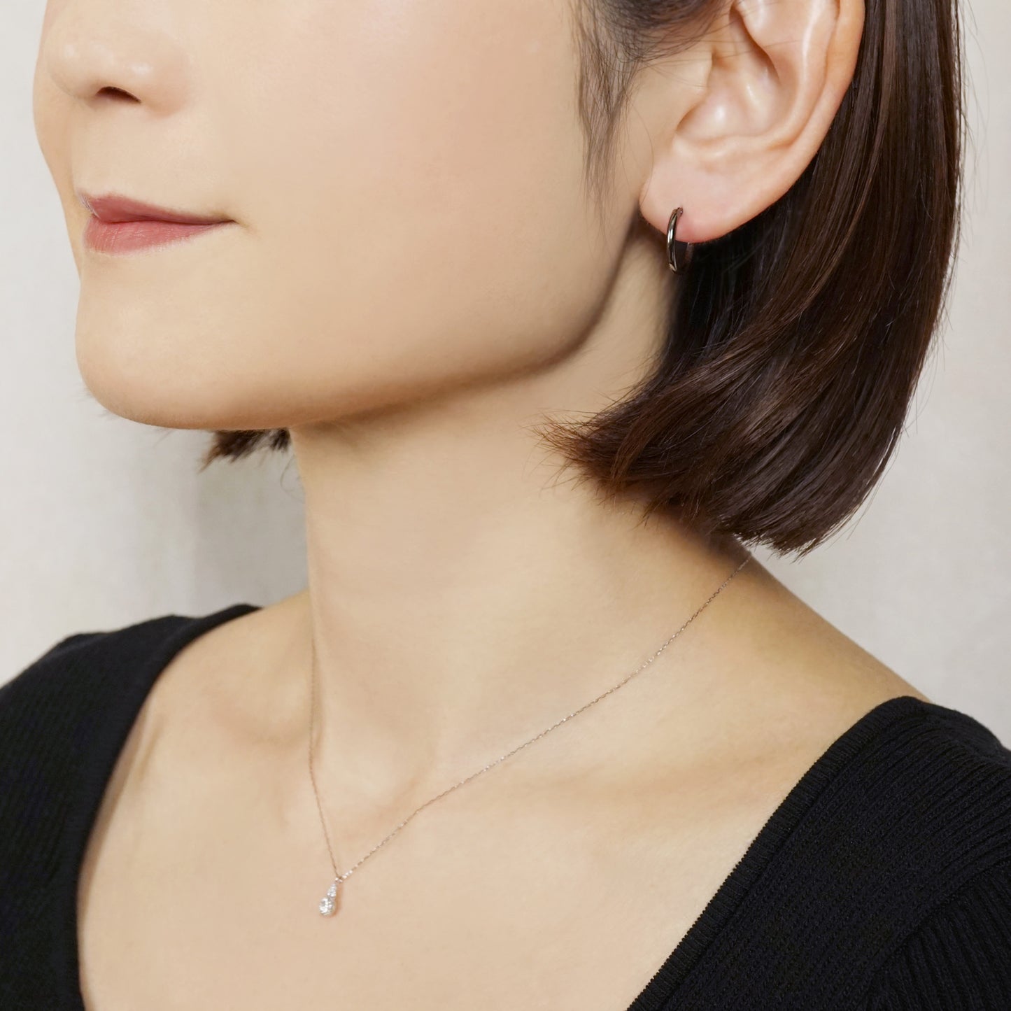 10K / 925 Sterling Silver Circle Wire Black Basic Hoop Earrings - Model Image