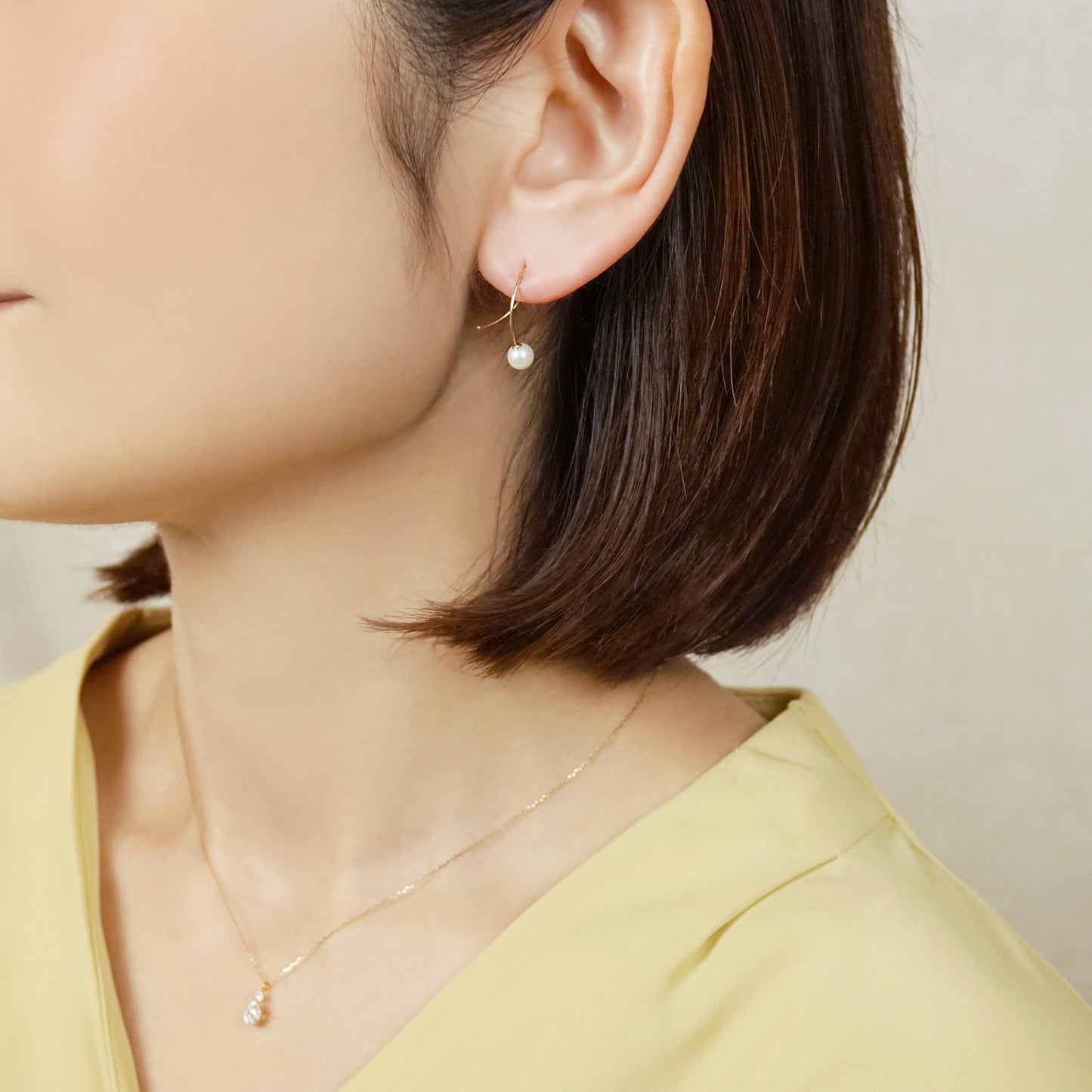 10K Cross Curve Freshwater Pearl Earrings (Yellow Gold) - Model Image