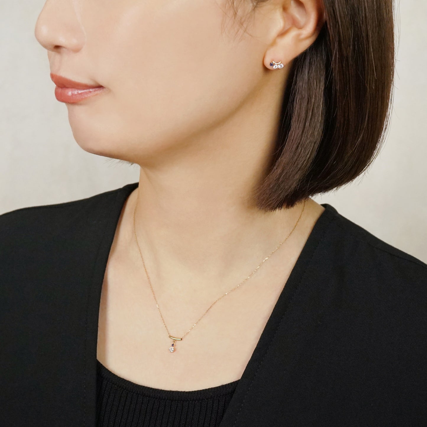 10K Shooting Star Moissanite Necklace (Yellow Gold) - Model Image