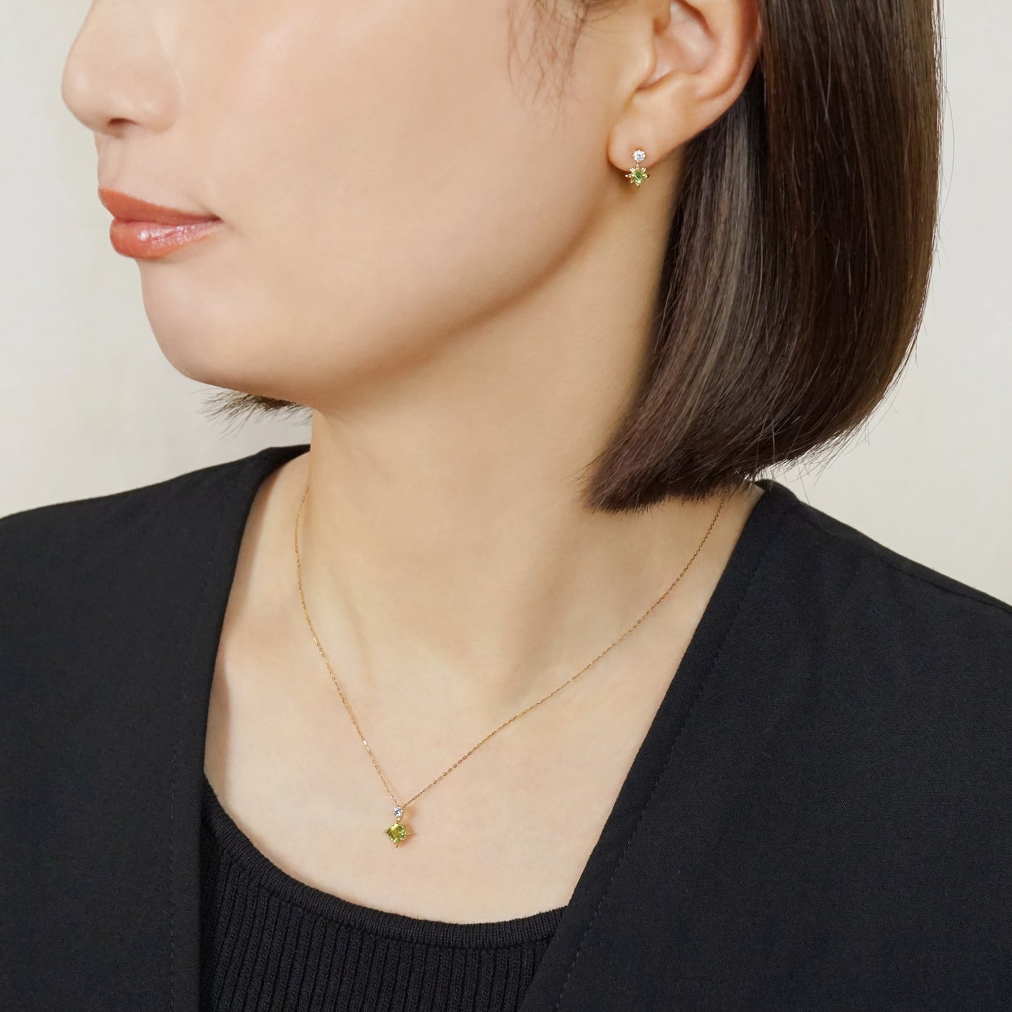 10K Comet Moissanite Earrings (Yellow Gold) - Model Image