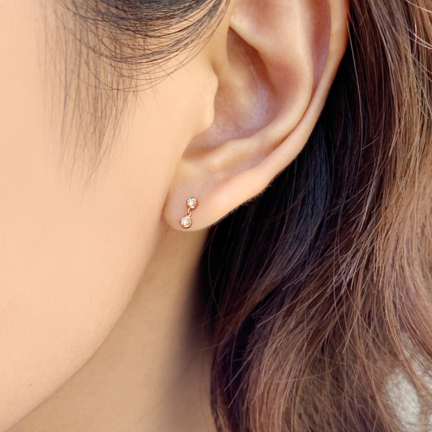 10K Twin Diamond Earrings (Rose Gold) - Model Image