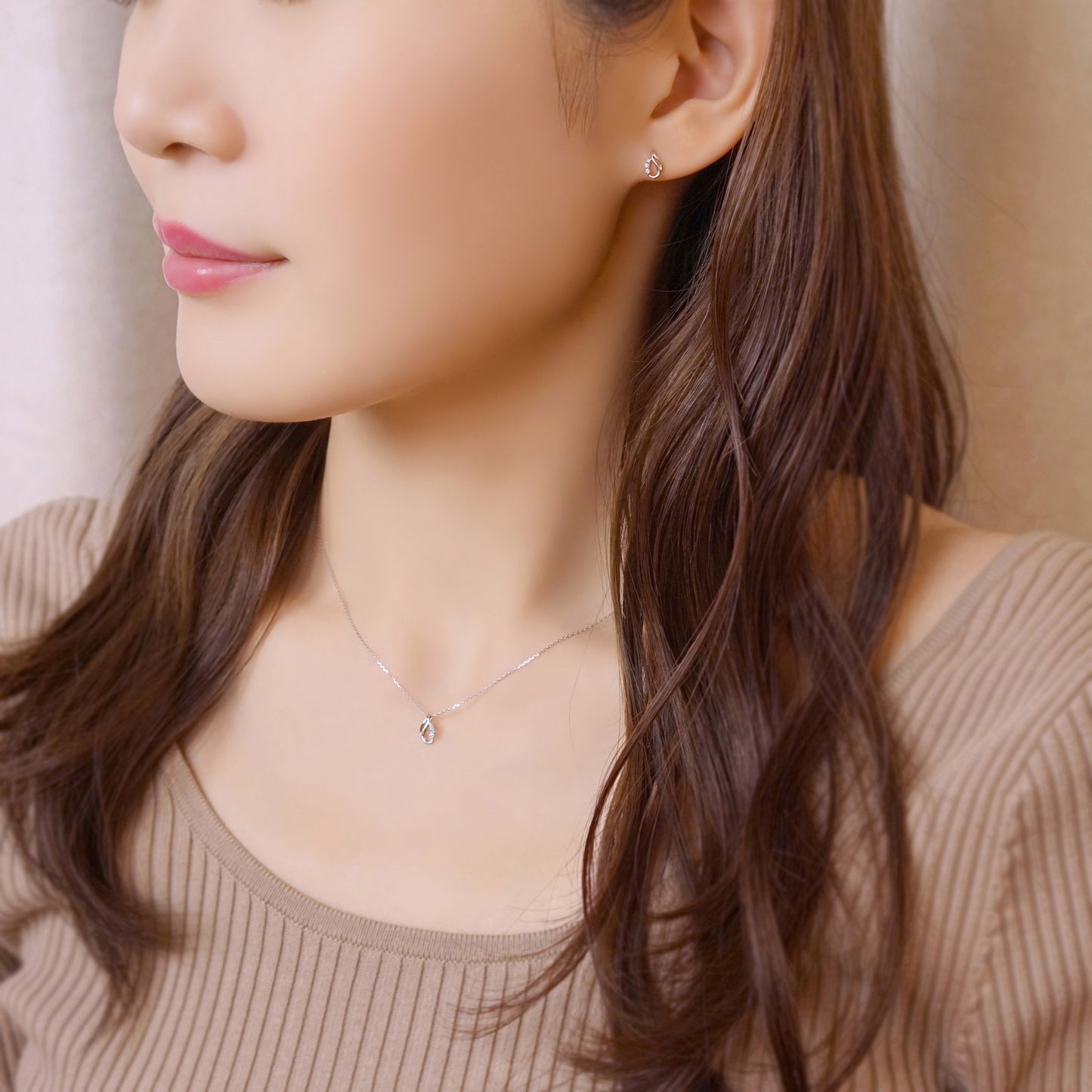 10K White Gold Diamond Tier Design Necklace - Model Image