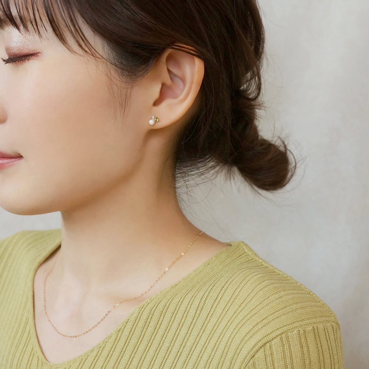 18K/10K Yellow Gold Peridot Stud Earrings - Model Image