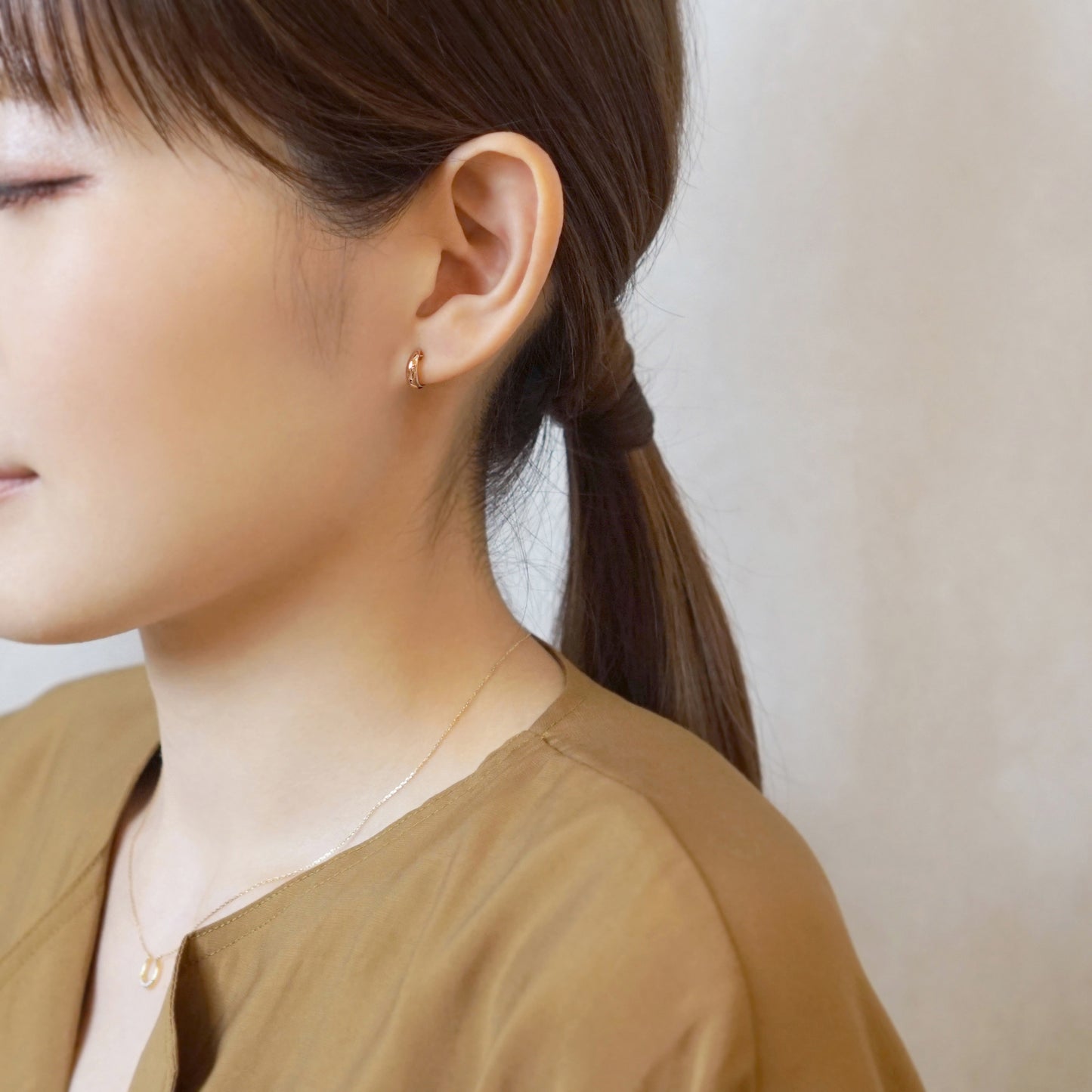 18K/10K Rose Gold Moon Design Hoop Mini Earrings - Model Image