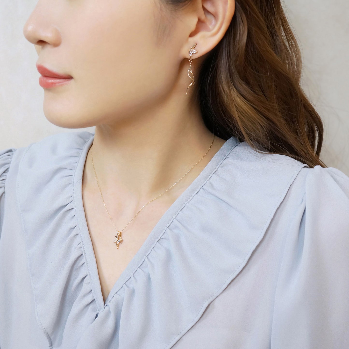 10K Moonstone x London Blue Topaz Necklace "Flutter" (Yellow Gold) - Model Image