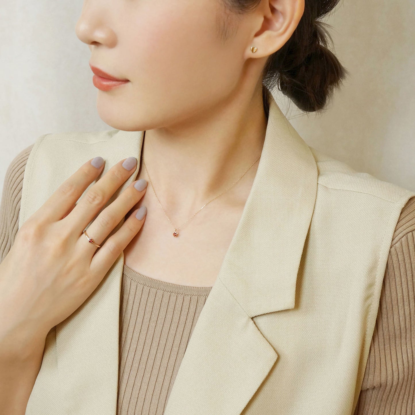 10K Yellow Gold Garnet Starlet Birthstone Necklace - Model Image