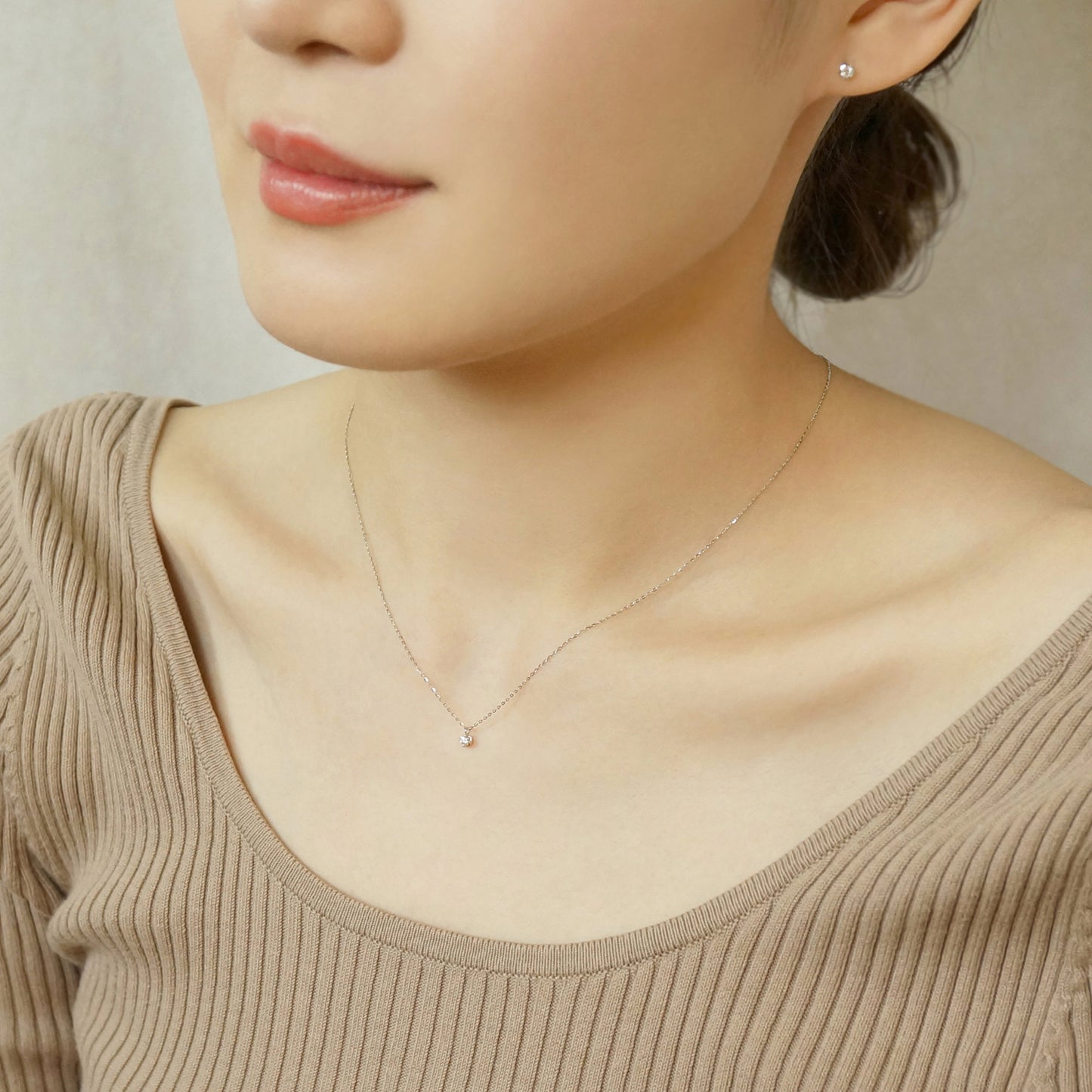 10K White Gold Diamond Solitaire Necklace - Model Image