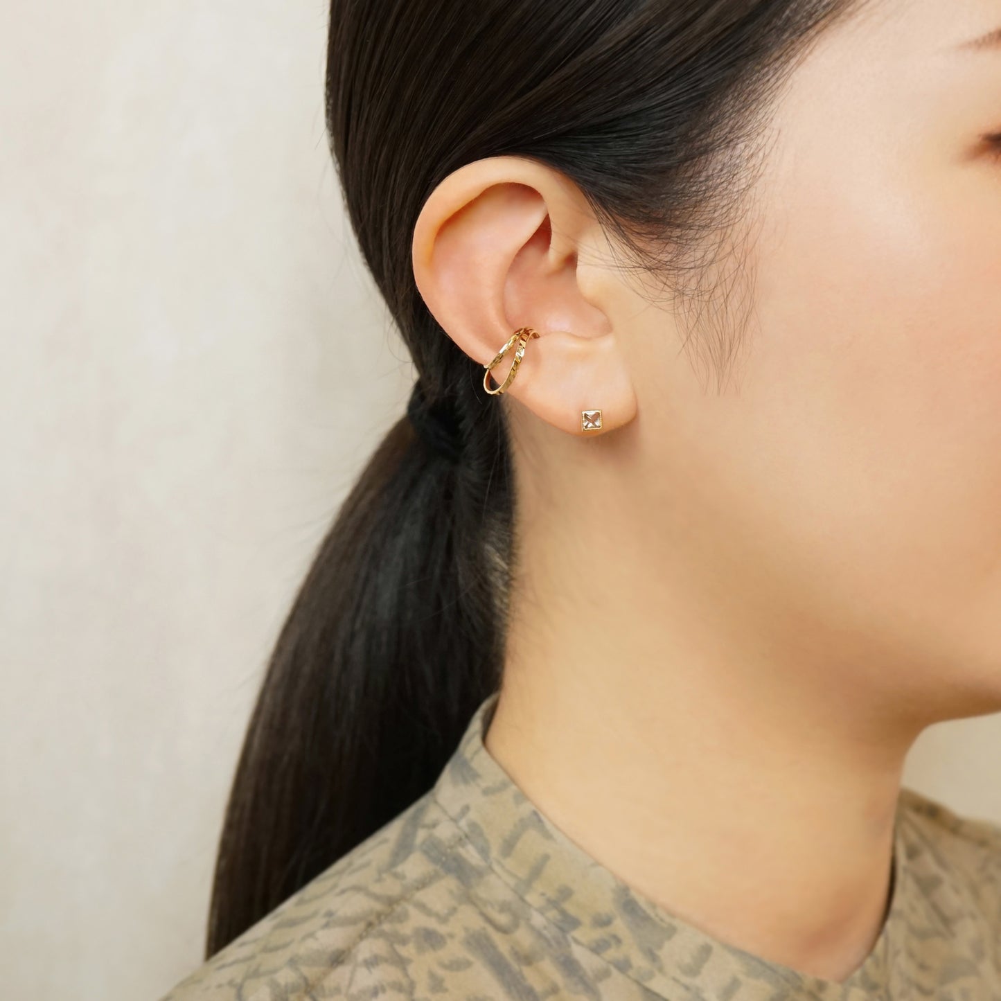 10K Yellow Gold Twin Sparkly Cut Line Ear Cuff - Model Image