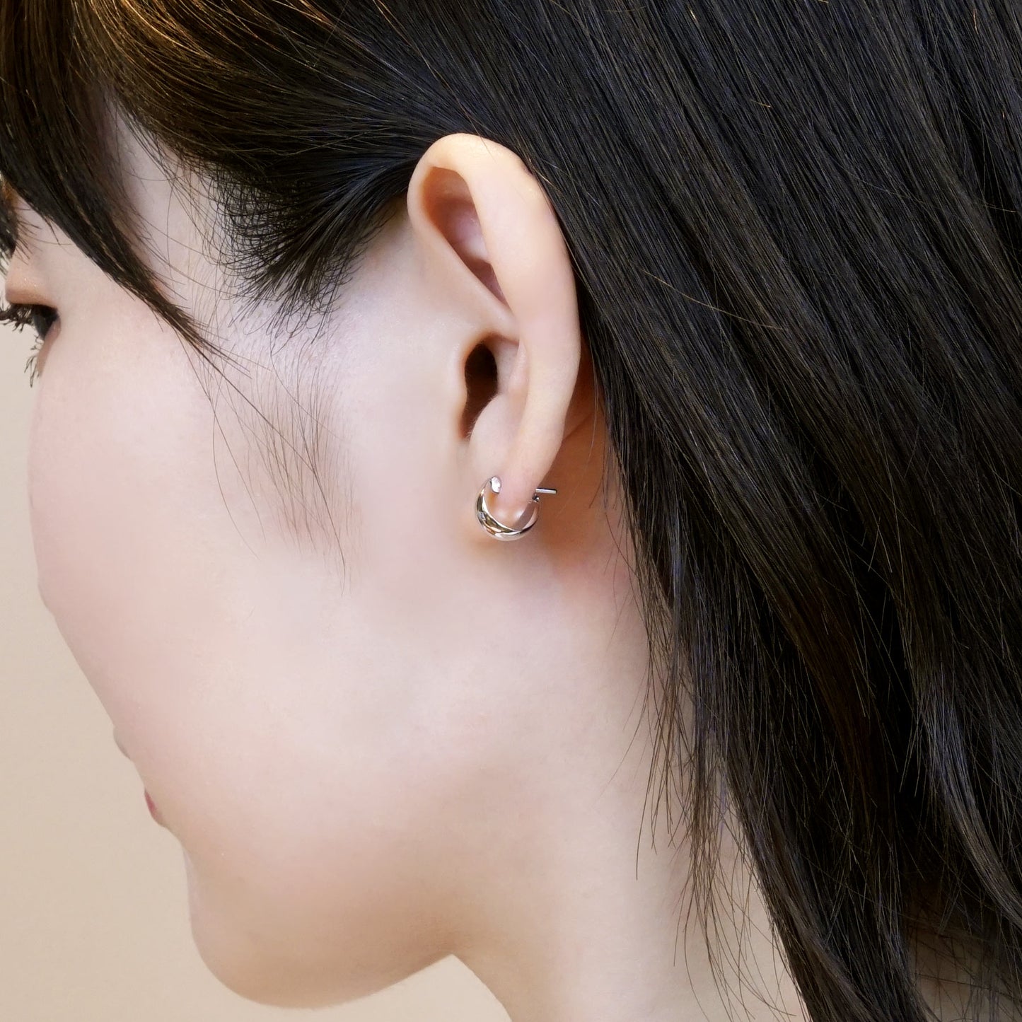 14K/10K White Gold Chunky Mini Hoop Earrings - Model Image