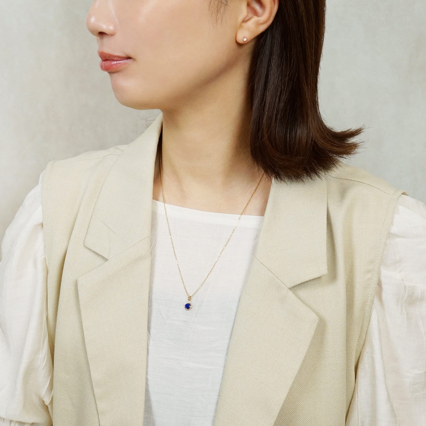 10K Lapis Lazuli Necklace Charm (Yellow Gold) - Model Image