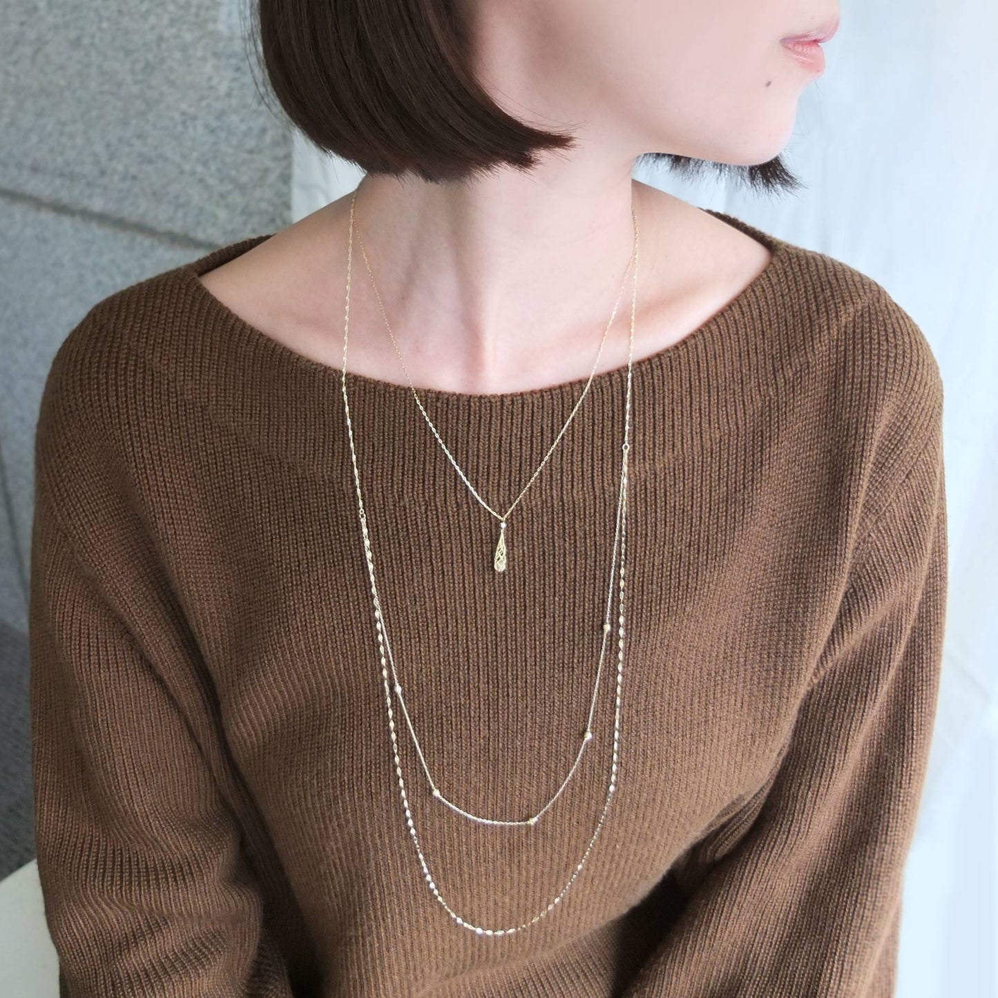 10K Yellow Gold Honey Cut Ball 3Way Long Necklace - Model Image