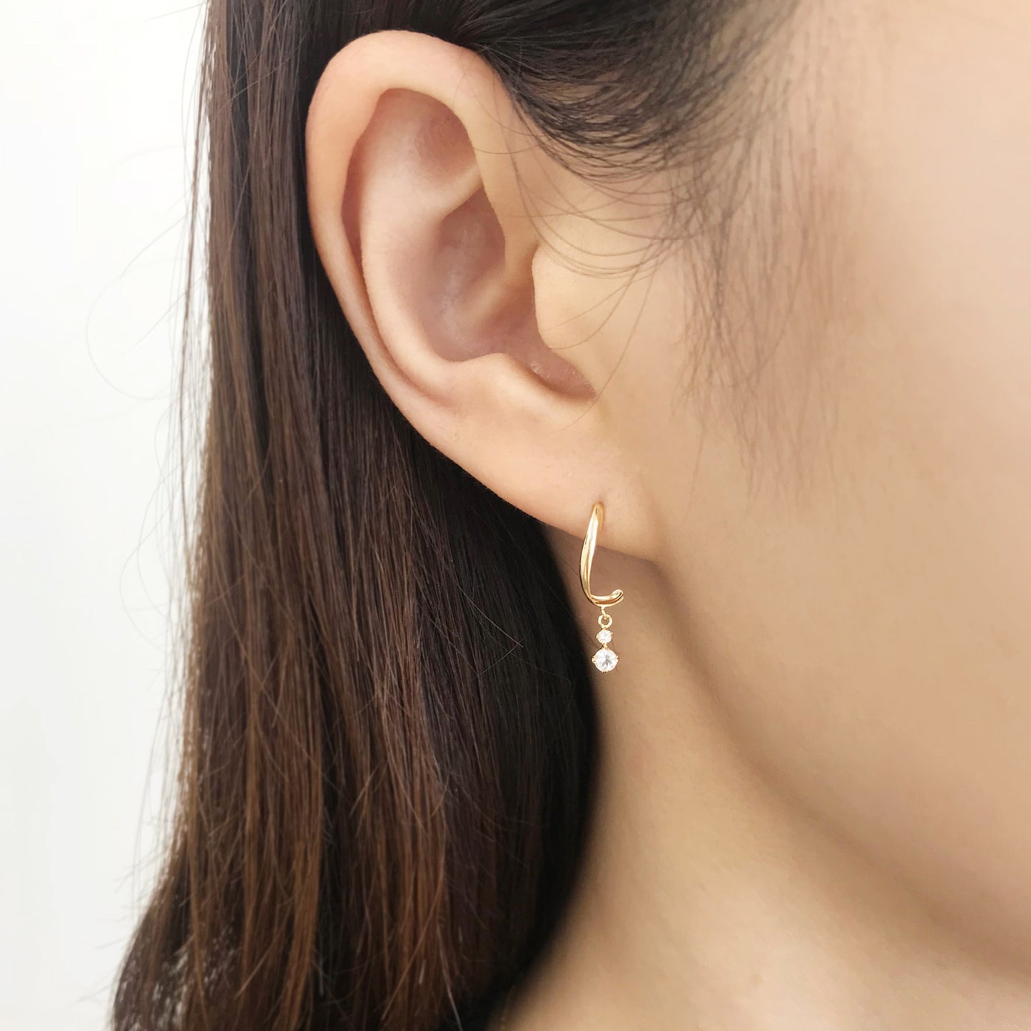 18K Yellow Gold Diamond Twisted Earrings - Model Image