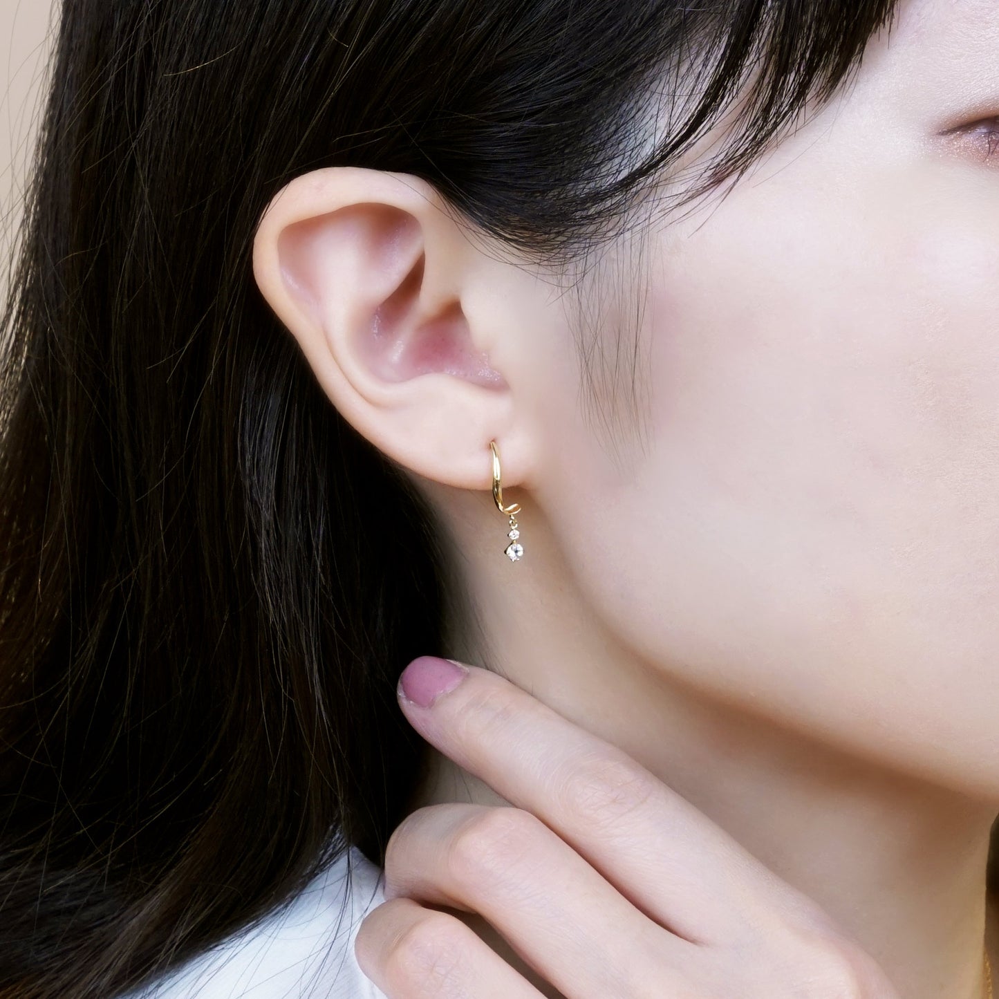 18K Yellow Gold Diamond Twisted Earrings - Model Image