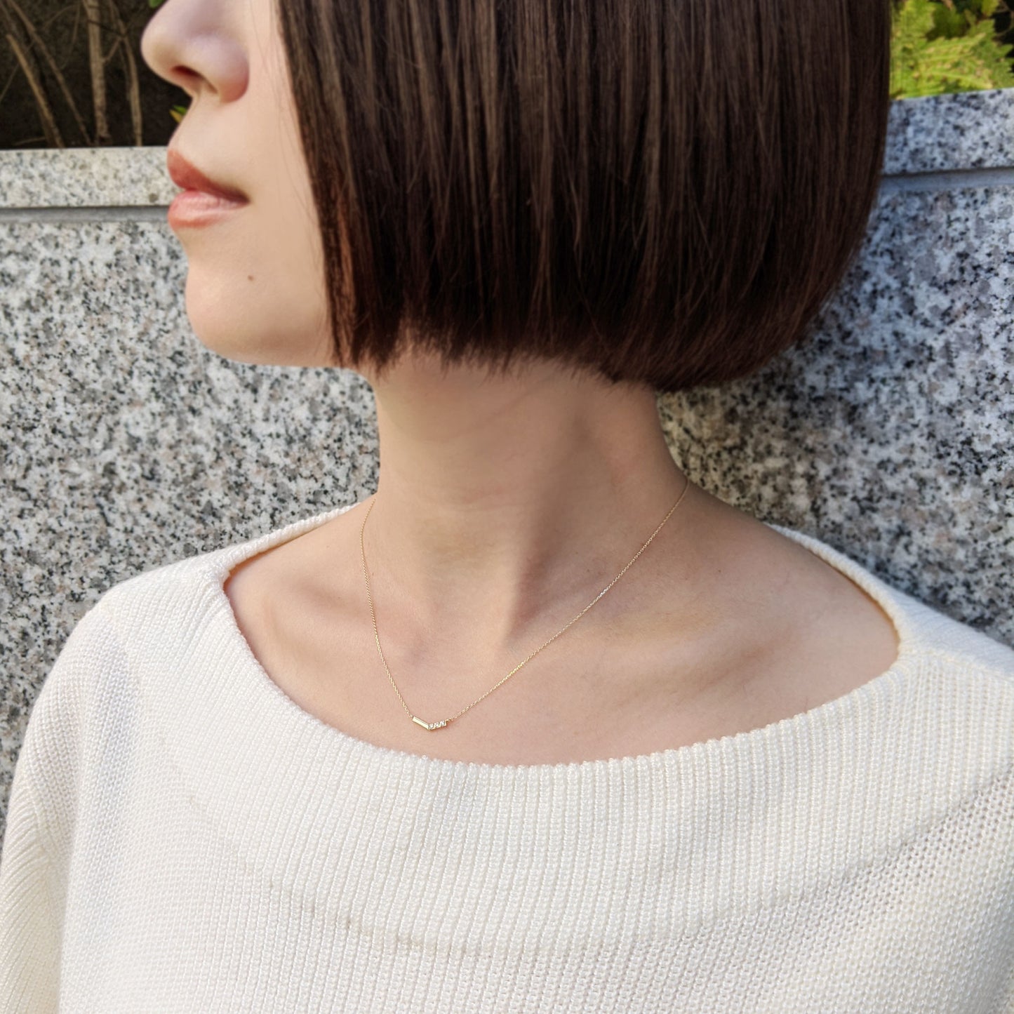 10K Yellow Gold Diamond V-Shaped 3-Stone Necklace - Model Image