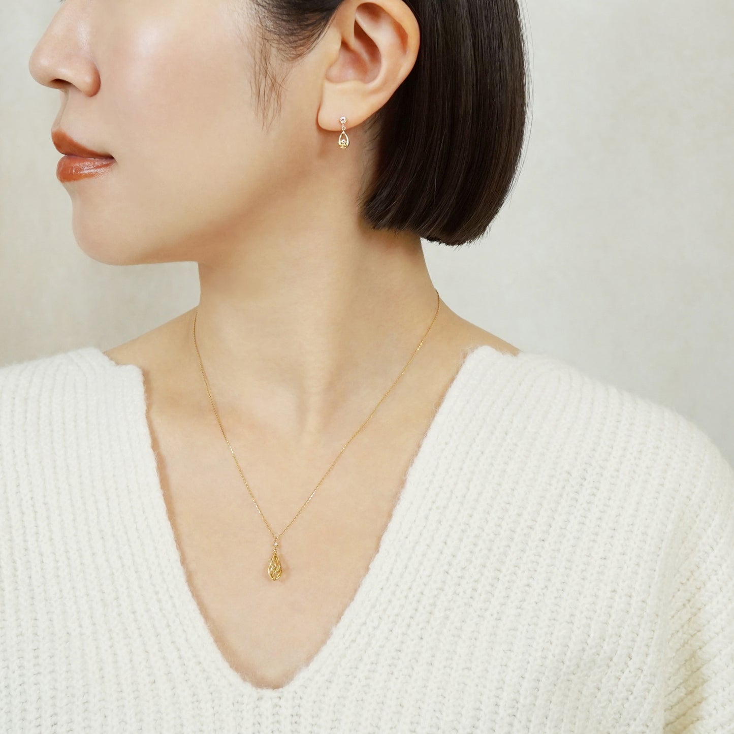 18K/10K Diamond Dew Drop Swinging Earrings (Yellow Gold) - Model Image