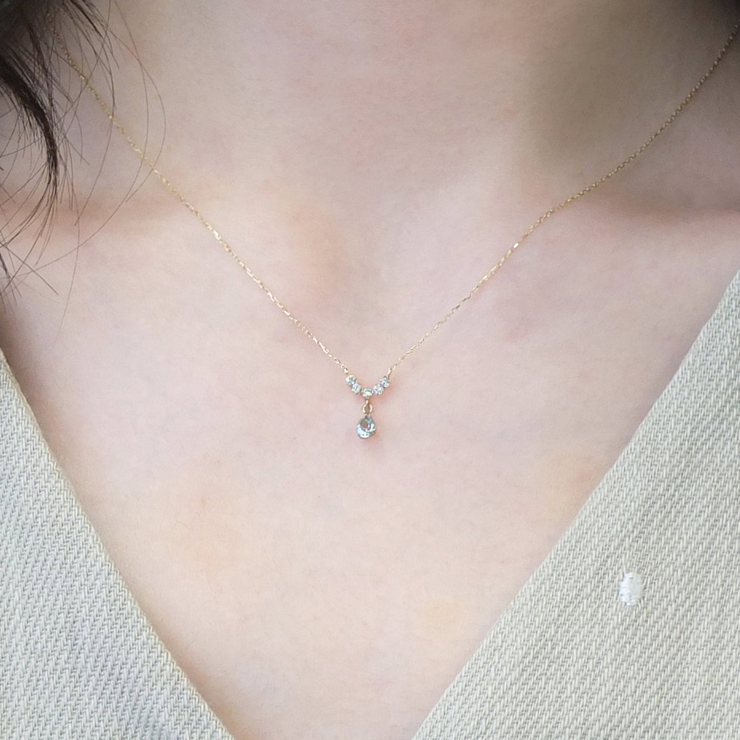 10K Yellow Gold Aquamarine Swinging Necklace - Model Image