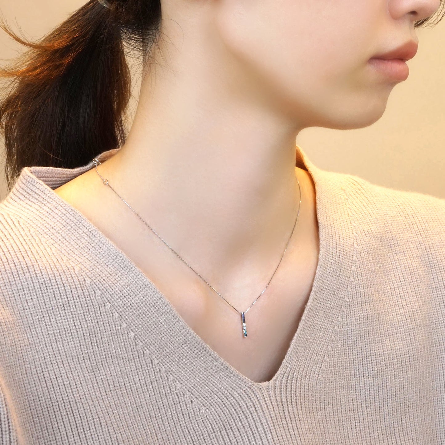 Ice Blue Diamond Gradient Straight Bar Necklace (10K White Gold) - Model Image