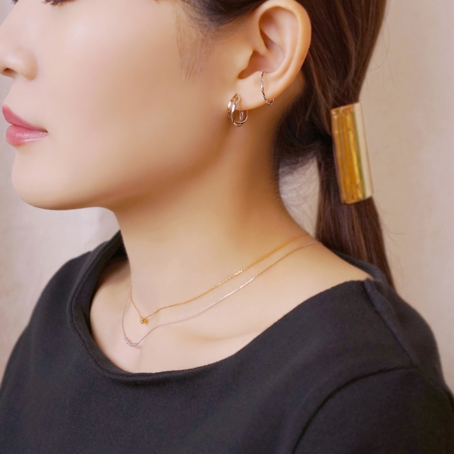 10K White Gold Glittering Wave Ear Cuff - Model Image