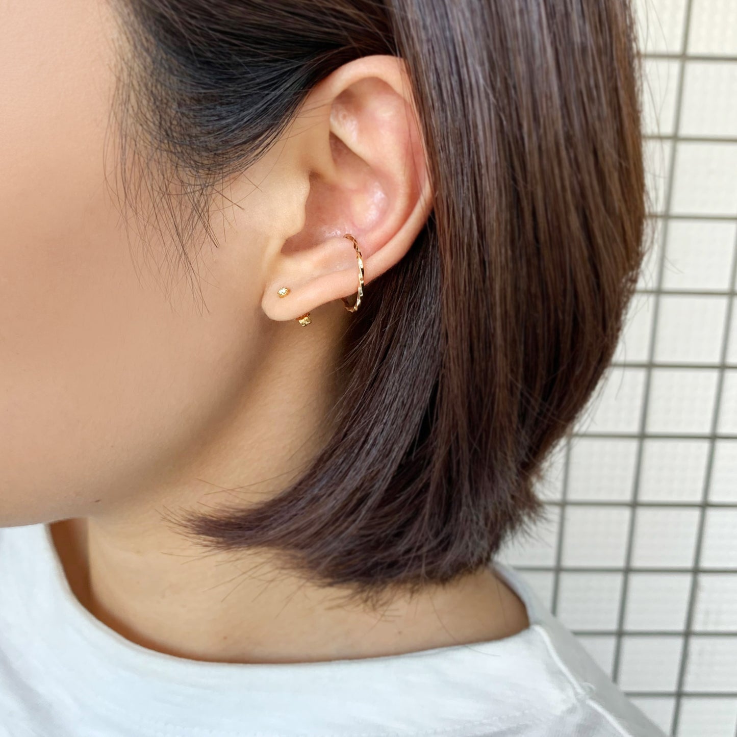 10K Yellow Gold Glittering Wave Ear Cuff - Model Image