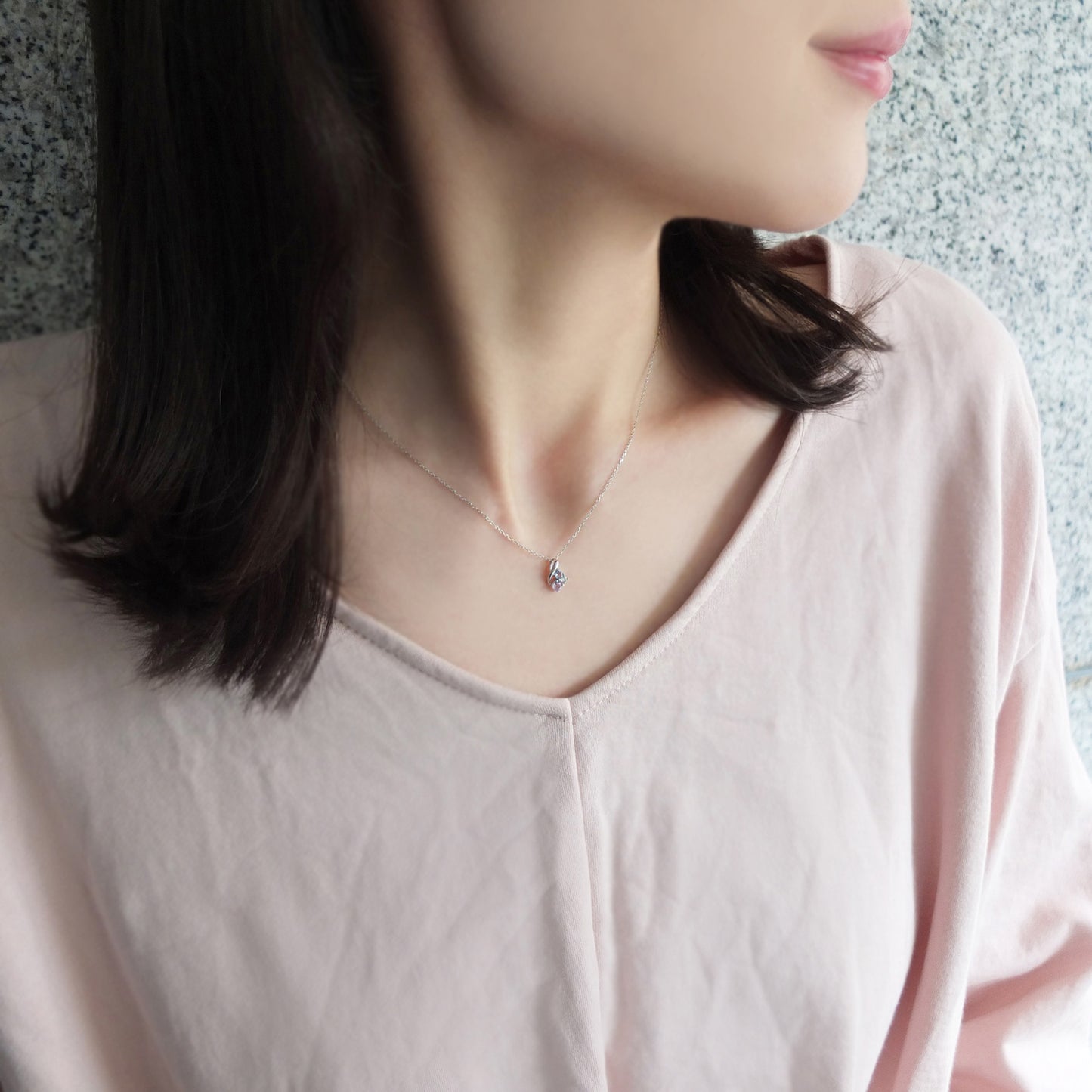 10K White Gold Tanzanite Twisted Necklace - Model Image