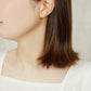[Second Earrings] 18K Lily Cut Peridot Earrings (Yellow Gold) - Model Image