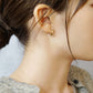 High-Quality Tri-Color Wave Hoop Earrings (Platinum / 18K Yellow Gold / 18K Rose Gold) - Model Image