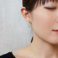 18K/10K Nuanced Wave Hoop Earrings (Yellow Gold) - Model Image