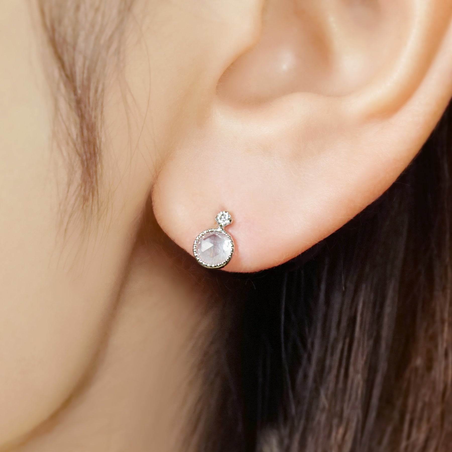 10K Sky Blue Topaz Stud Earrings (White Gold) - Model Image