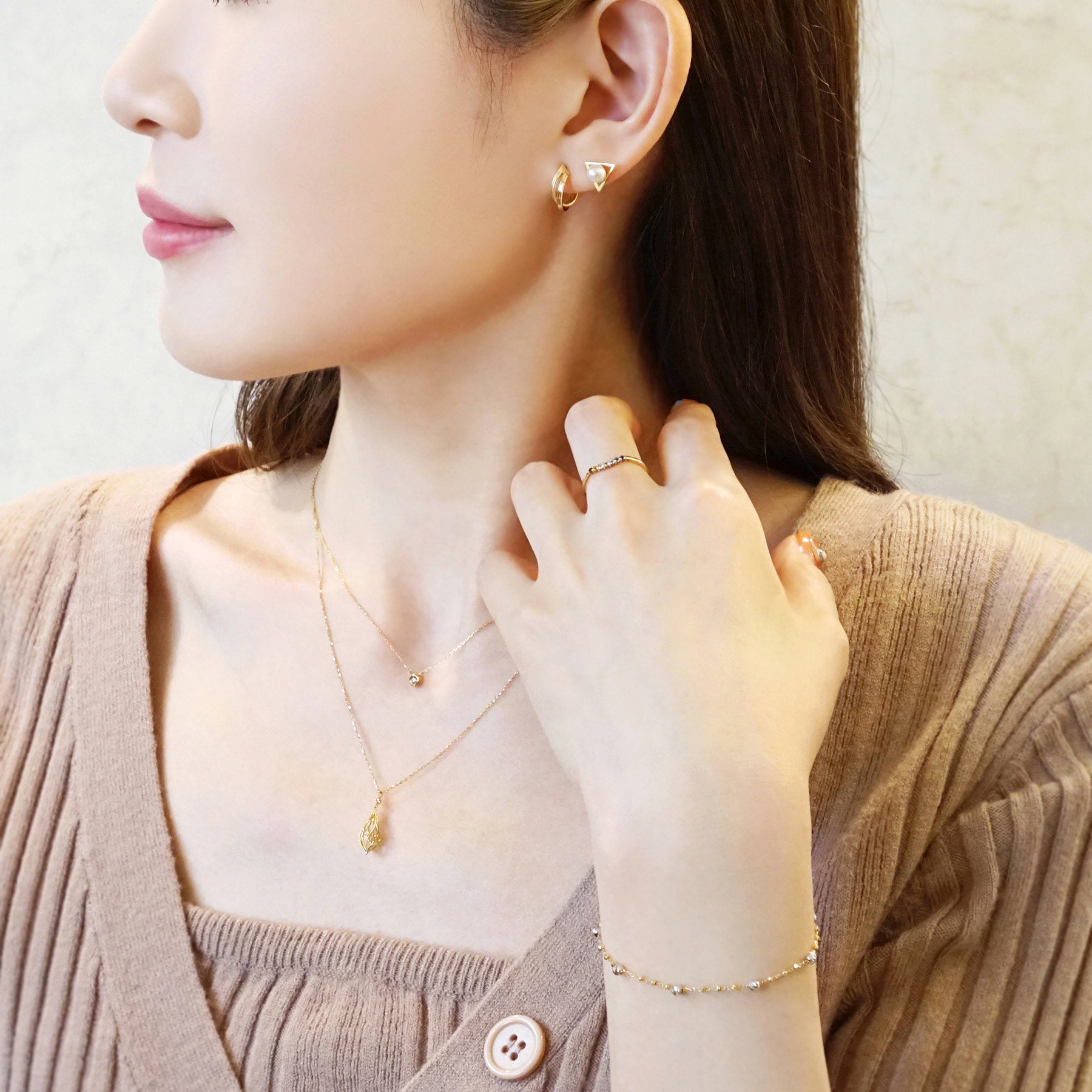 18K Twisted Twin Hoop Earrings (Yellow Gold) - Model Image