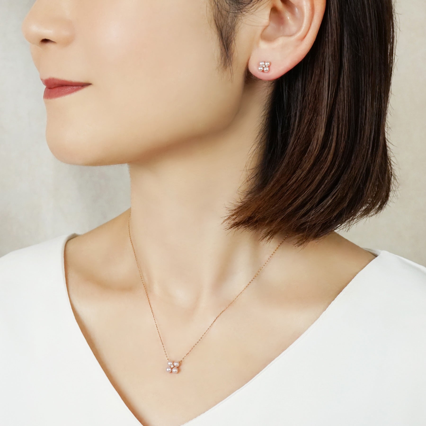 18K/10K Pink Freshwater Pearl Clover Earrings (Rose Gold) - Model Image