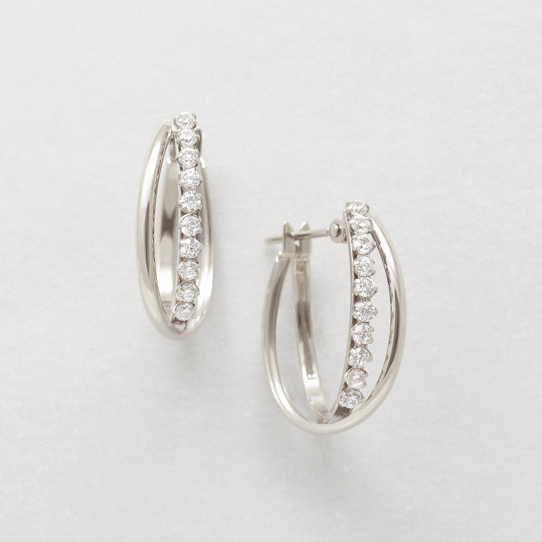 14K/10K Cubic Zirconia Oval Hoop Earrings (White Gold) - Product Image