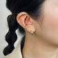 Platinum Double Twist Hoop Earrings - Model Image
