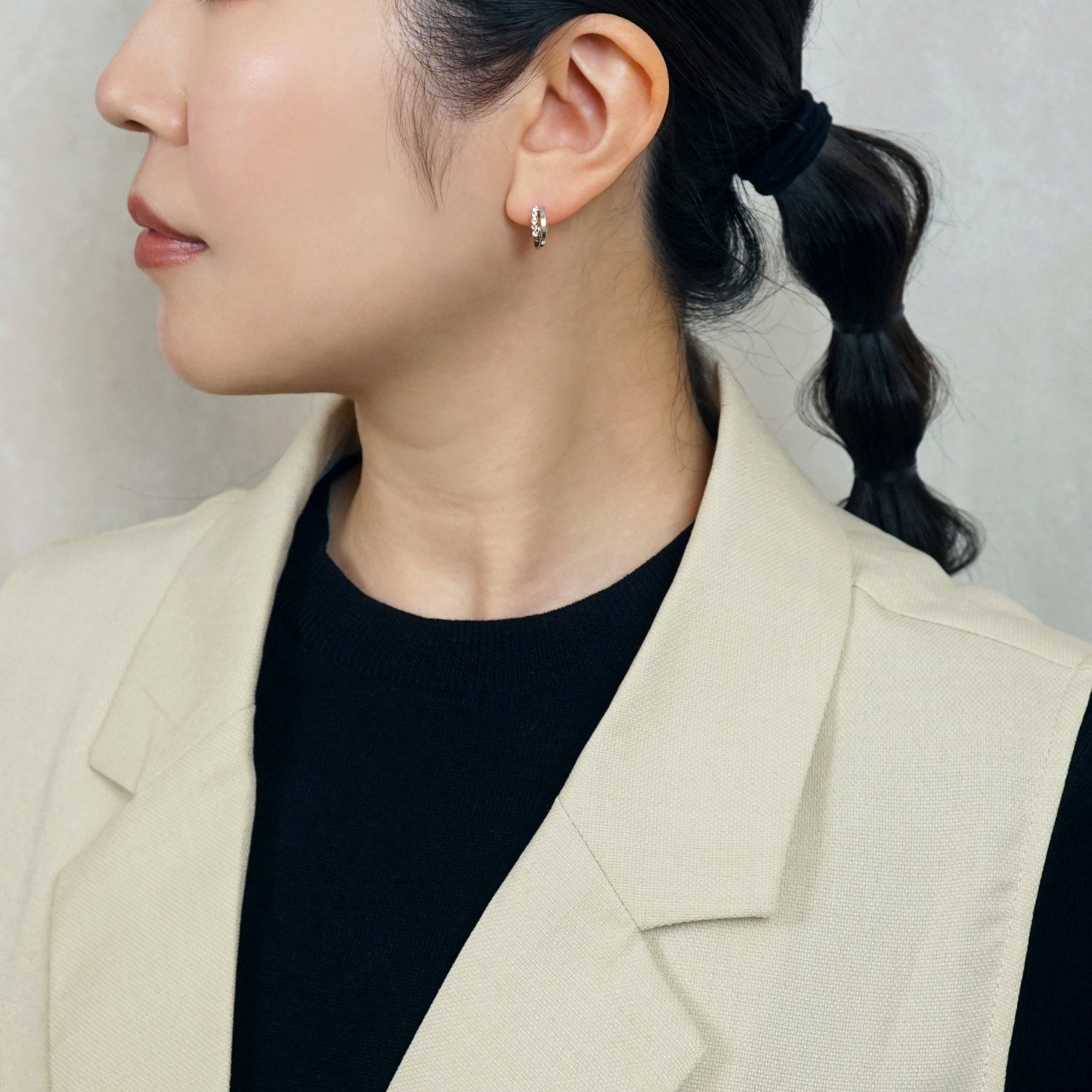 Platinum Double Twist Hoop Earrings - Model Image