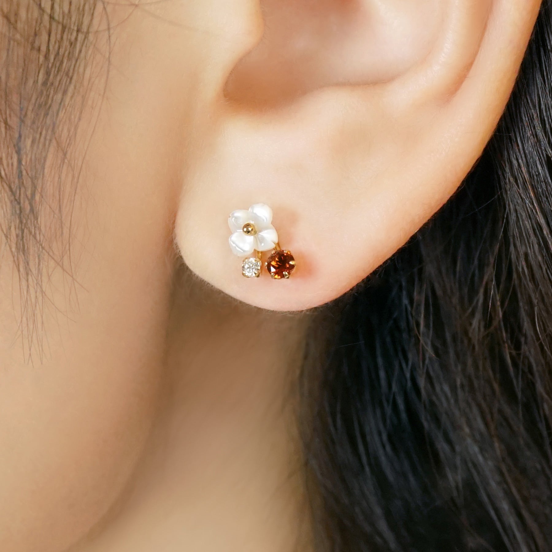 18K/10K White Shell Garnet Flower Stud Earrings (Yellow Gold) - Model Image