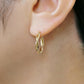 18K/10K Twisted Pipe Hoop Earrings (Yellow Gold) - Model Image