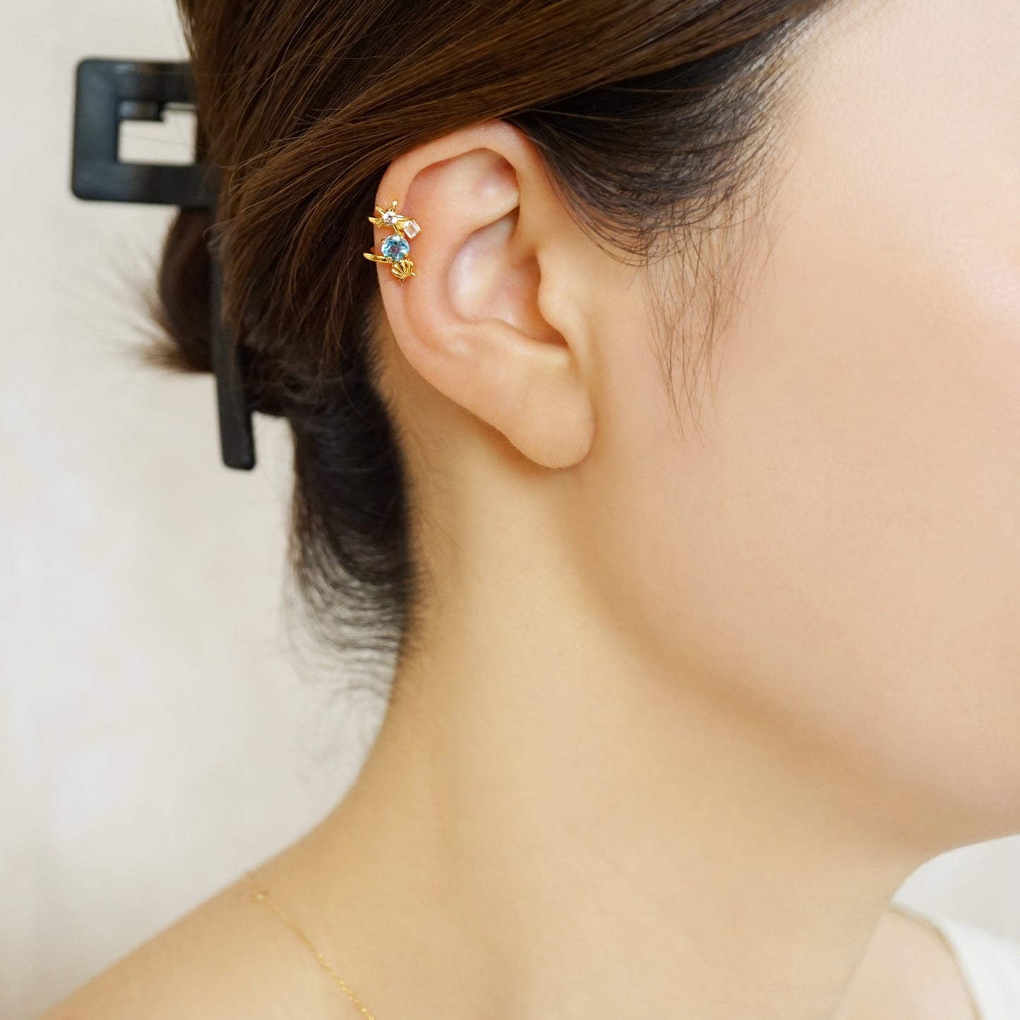 925 Sterling Silver Blue Topaz Coquille Ear Cuff - Model Image