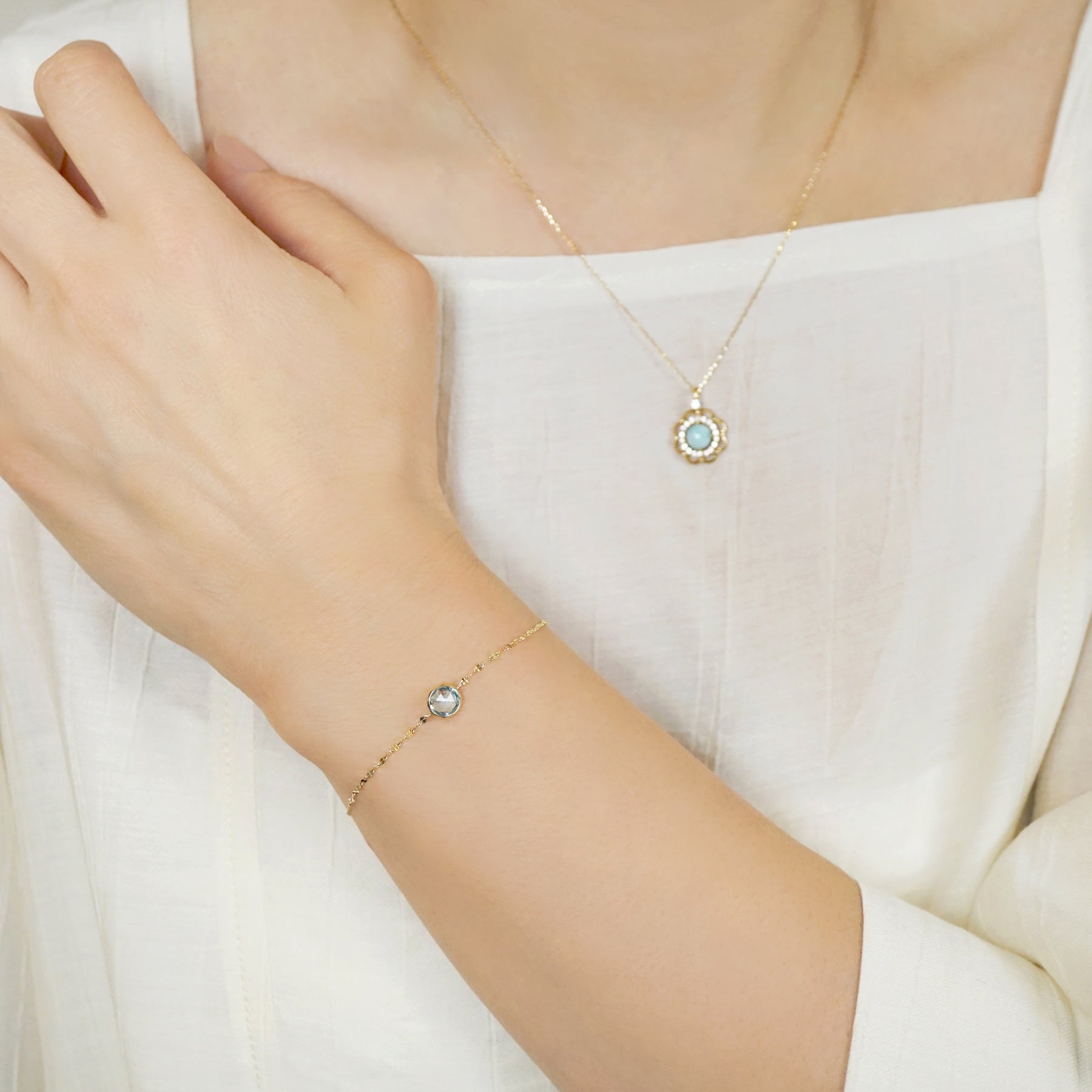 10K Blue Topaz Bracelet [Luminous Flow] (Yellow Gold) - Model Image