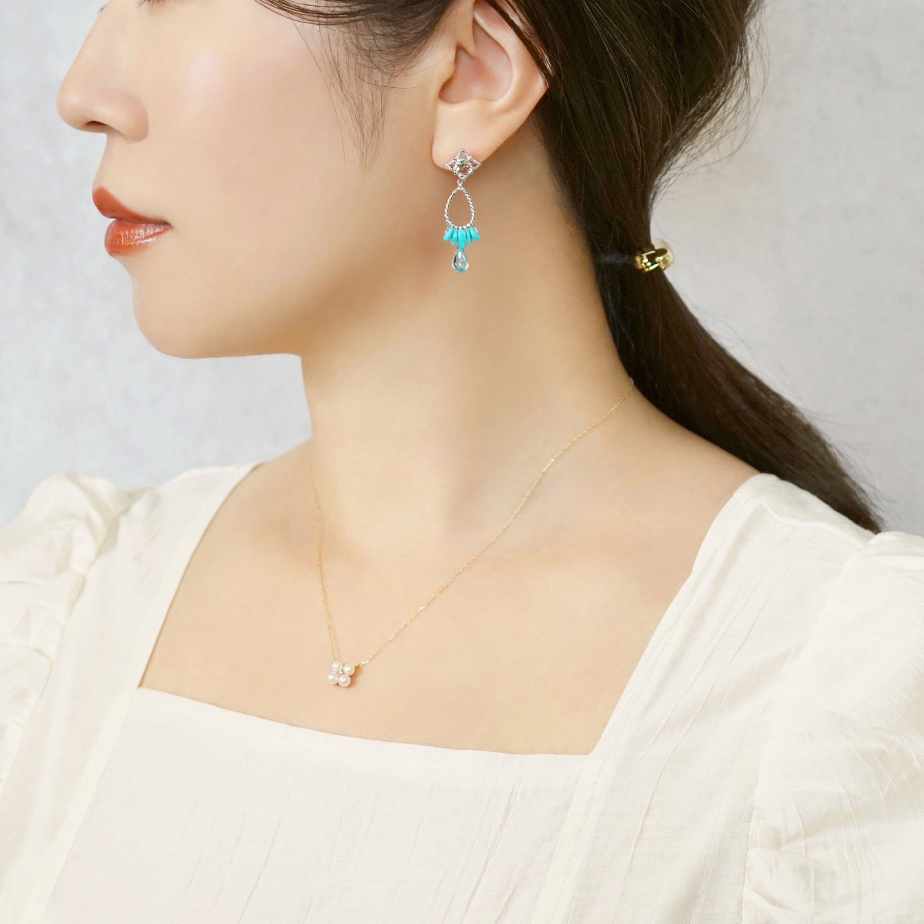 10K / 925 Sterling Silver Blue Zircon Earrings [Sea Glass] - Model Image