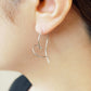 Gold Filled Twisted Heart Earrings (Platinum Plated) - Model Image