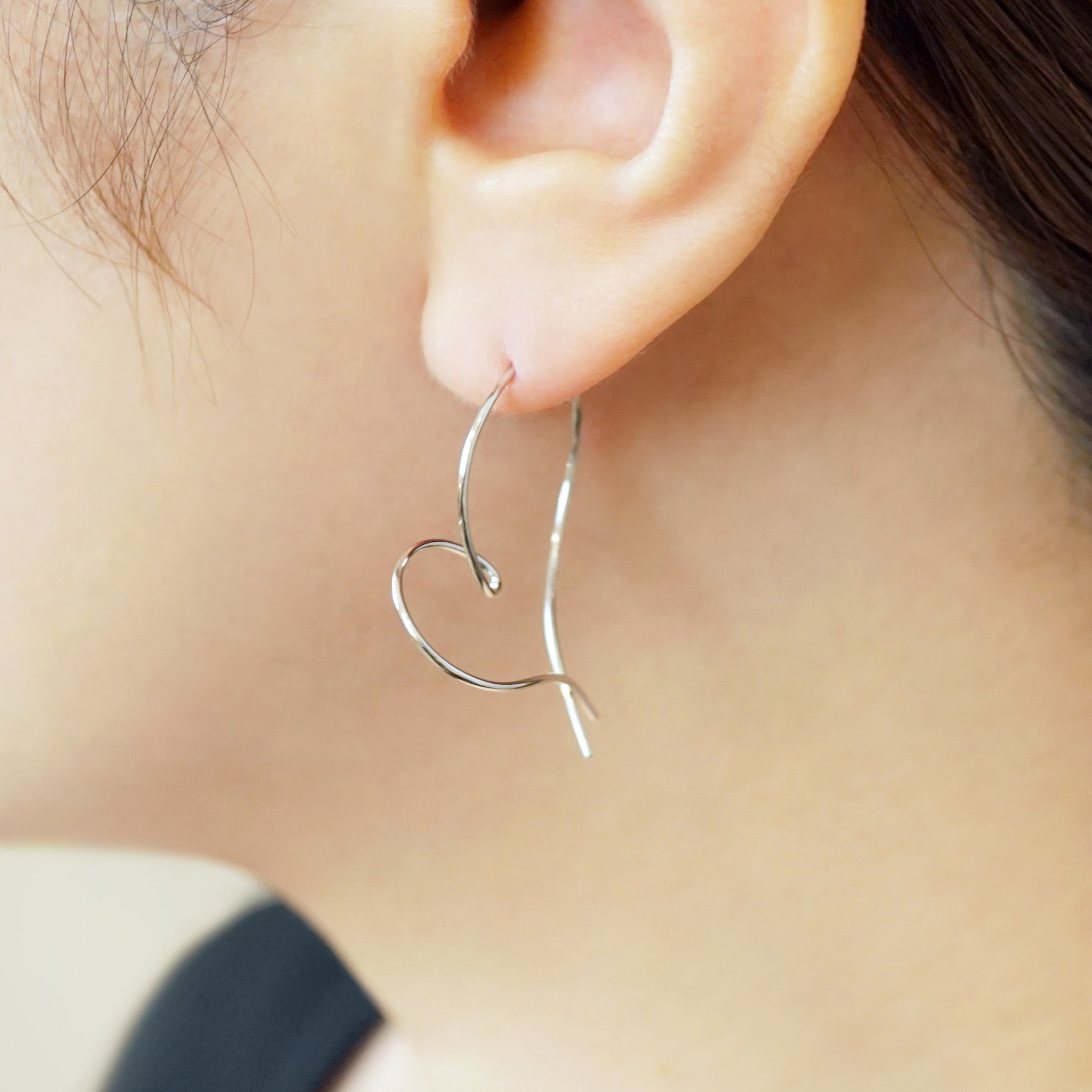 Gold Filled Twisted Heart Earrings (Platinum Plated) - Model Image