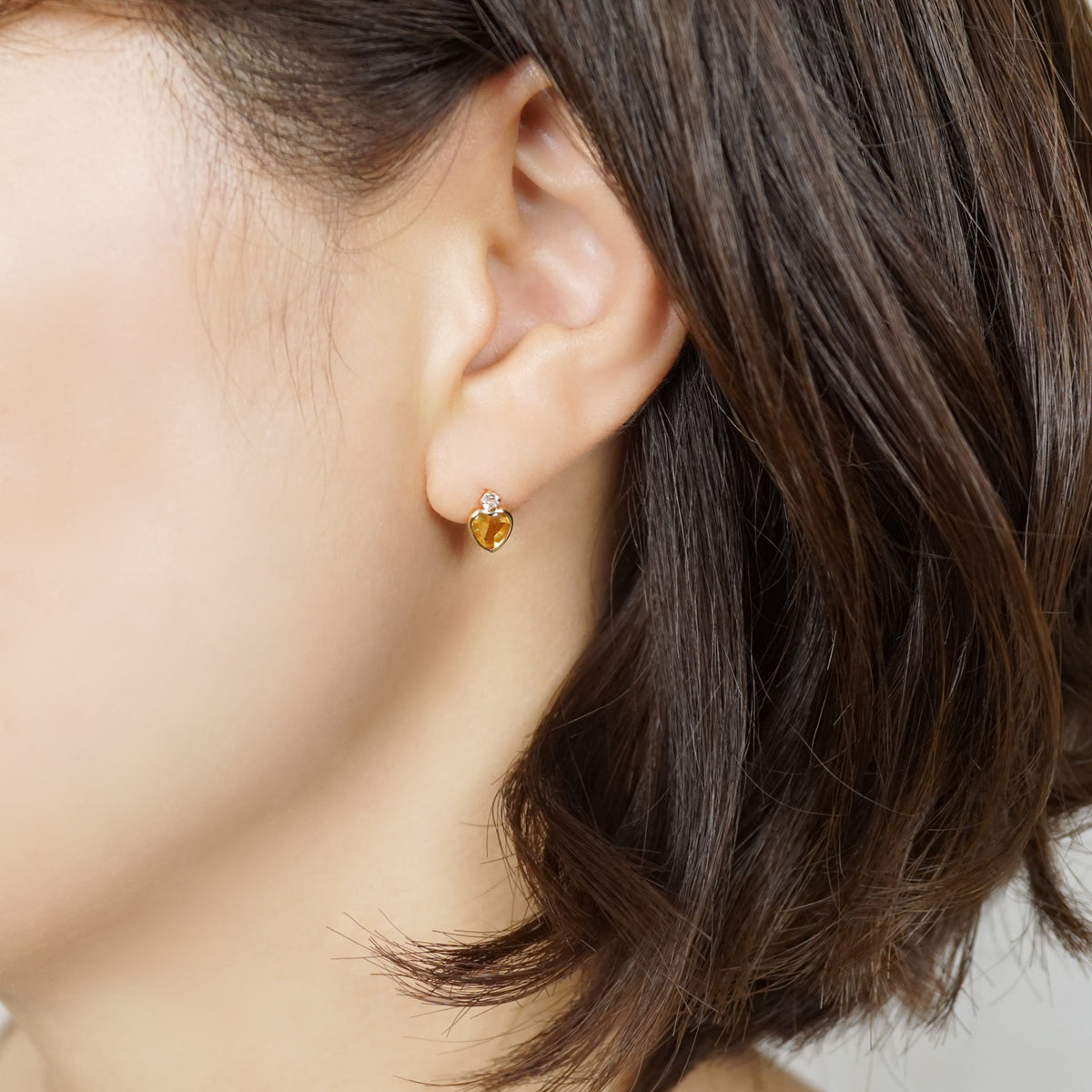 10K Citrine Heart Love Earrings (Yellow Gold) - Model Image